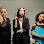 Pharmaceutical industry professionals collaborating on leadership development initiatives for women in the sector